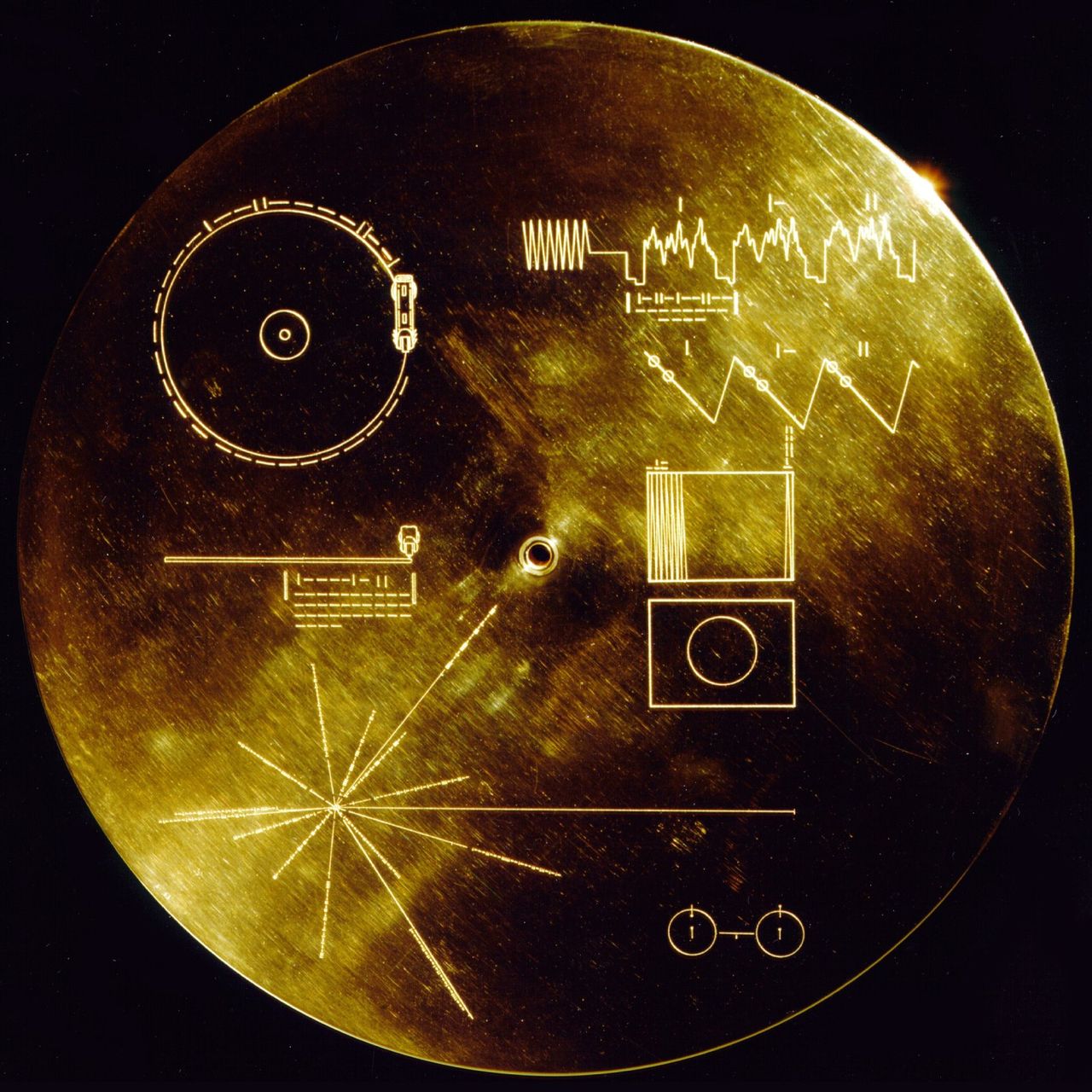 The gold-plated cover of the Voyager Golden Record, engraved with diagrams explaining how to play it and where it came from